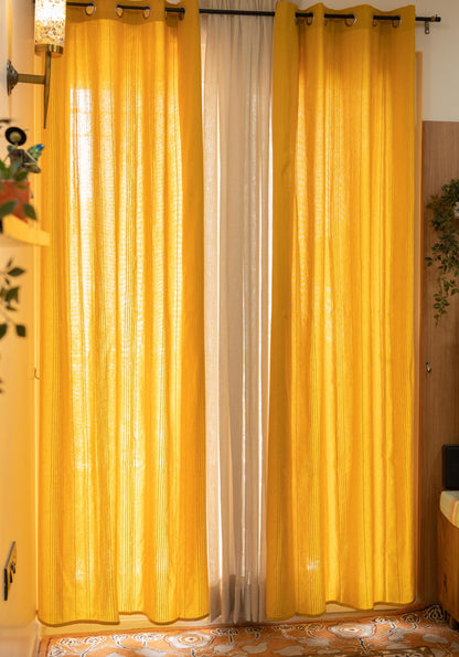 Handloom Cotton Yellow Solid Light Filtering Curtains 9 feet (Set of 2)